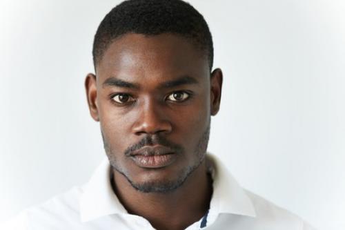 59327888 highly detailed close up portrait of handsome young african american man wearing stylish polo shirt 